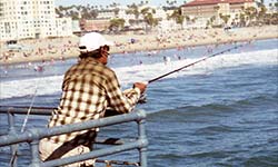Gentleman fishing on a pier